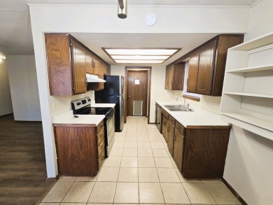 Welcome to this inviting 3-bedroom, 2-bathroom home offering on Pheasant Run in Oklahoma - for sale on GolfHomes.com, golf home, golf lot