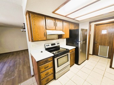 Welcome to this inviting 3-bedroom, 2-bathroom home offering on Pheasant Run in Oklahoma - for sale on GolfHomes.com, golf home, golf lot