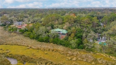 Stunning Views | Stunning Spaces | Stunning Staircase 

Nestled on The King and Prince Golf Course, Home of the Hampton Club in Georgia - for sale on GolfHomes.com, golf home, golf lot