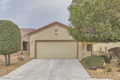 Welcome to this Sage model with a private courtyard and stunning on Aliante Golf Club in Nevada - for sale on GolfHomes.com, golf home, golf lot