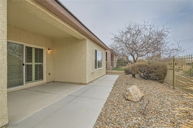 Welcome to this Sage model with a private courtyard and stunning on Aliante Golf Club in Nevada - for sale on GolfHomes.com, golf home, golf lot