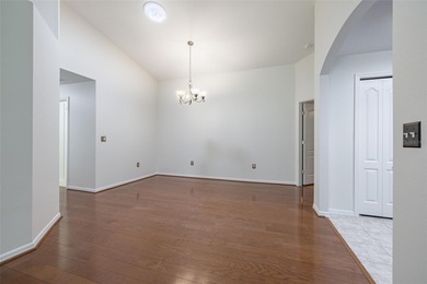 A COZY SPLIT 3-BEDROOM, 2-BATHROOM, 2-CAR GARAGE HOME LOCATED ON on Tampa Bay Golf and Country Club in Florida - for sale on GolfHomes.com, golf home, golf lot