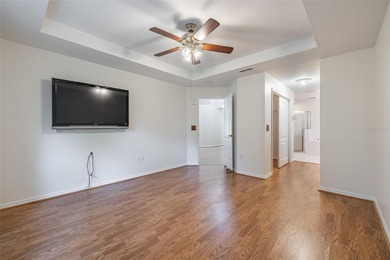 A COZY SPLIT 3-BEDROOM, 2-BATHROOM, 2-CAR GARAGE HOME LOCATED ON on Tampa Bay Golf and Country Club in Florida - for sale on GolfHomes.com, golf home, golf lot