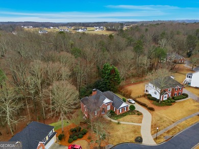 Elegant Four-Sided Brick Ranch in The Providence Club on The Providence Club in Georgia - for sale on GolfHomes.com, golf home, golf lot