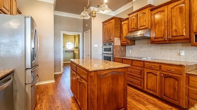 Located in the Equestrian section of Pecan Plantation, this on Pecan Plantation Country Club in Texas - for sale on GolfHomes.com, golf home, golf lot