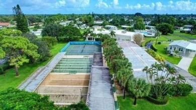 Three bedroom, Two bath with lots of space inside and out, Just on Cypress Creek Country Club - Boynton Beach in Florida - for sale on GolfHomes.com, golf home, golf lot