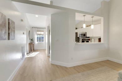This private second-floor end unit residence is light & bright on Lely Resort Golf and Country Club in Florida - for sale on GolfHomes.com, golf home, golf lot