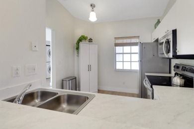 This private second-floor end unit residence is light & bright on Lely Resort Golf and Country Club in Florida - for sale on GolfHomes.com, golf home, golf lot