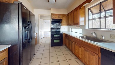 Located in the gated community of Pecan Plantation, this on Pecan Plantation Country Club in Texas - for sale on GolfHomes.com, golf home, golf lot