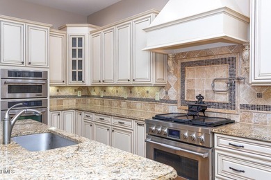 Designed for those who appreciate space with intention, this on Hasentree Club in North Carolina - for sale on GolfHomes.com, golf home, golf lot