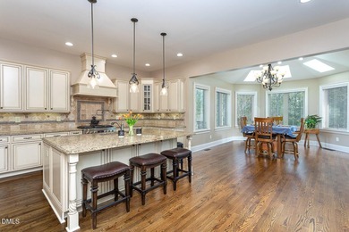 Designed for those who appreciate space with intention, this on Hasentree Club in North Carolina - for sale on GolfHomes.com, golf home, golf lot