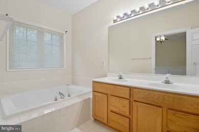 Located on one of the neighborhood's most coveted lots, this on Virginia Oaks Golf Club in Virginia - for sale on GolfHomes.com, golf home, golf lot
