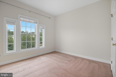 Located on one of the neighborhood's most coveted lots, this on Virginia Oaks Golf Club in Virginia - for sale on GolfHomes.com, golf home, golf lot