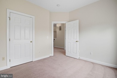 Located on one of the neighborhood's most coveted lots, this on Virginia Oaks Golf Club in Virginia - for sale on GolfHomes.com, golf home, golf lot