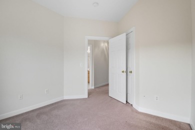 Located on one of the neighborhood's most coveted lots, this on Virginia Oaks Golf Club in Virginia - for sale on GolfHomes.com, golf home, golf lot