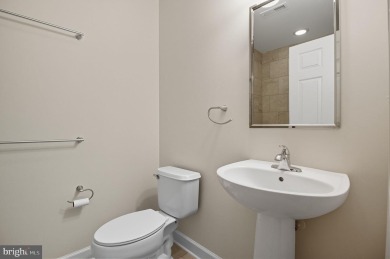 Located on one of the neighborhood's most coveted lots, this on Virginia Oaks Golf Club in Virginia - for sale on GolfHomes.com, golf home, golf lot