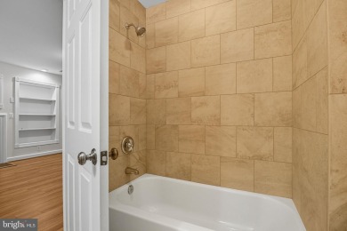 Located on one of the neighborhood's most coveted lots, this on Virginia Oaks Golf Club in Virginia - for sale on GolfHomes.com, golf home, golf lot
