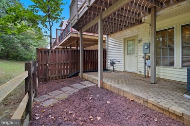 Located on one of the neighborhood's most coveted lots, this on Virginia Oaks Golf Club in Virginia - for sale on GolfHomes.com, golf home, golf lot