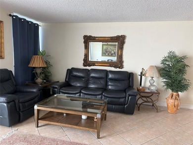 Beautiful upper level townhouse walking distance to the Club on Boca West Golf and Country Club in Florida - for sale on GolfHomes.com, golf home, golf lot