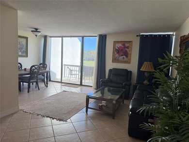 Beautiful upper level townhouse walking distance to the Club on Boca West Golf and Country Club in Florida - for sale on GolfHomes.com, golf home, golf lot