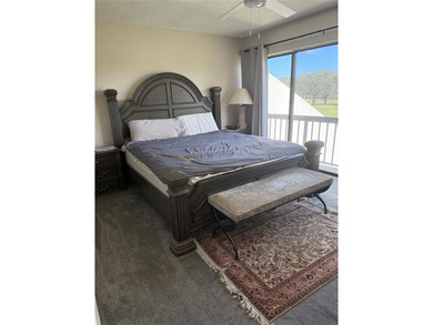 Beautiful upper level townhouse walking distance to the Club on Boca West Golf and Country Club in Florida - for sale on GolfHomes.com, golf home, golf lot