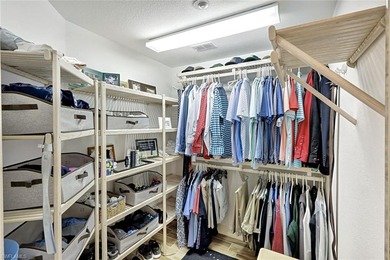 Welcome to effortless living in Palm Colony at Pelican Landing on The Colony Golf and Country Club in Florida - for sale on GolfHomes.com, golf home, golf lot