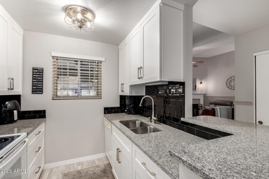 Beautifully updated 2-bedroom, 2-bath condo in the highly on Country Meadows Golf Club in Arizona - for sale on GolfHomes.com, golf home, golf lot