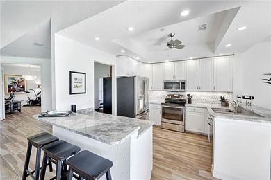 Welcome to effortless living in Palm Colony at Pelican Landing on The Colony Golf and Country Club in Florida - for sale on GolfHomes.com, golf home, golf lot