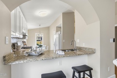 Beautifully maintained ranch home in a prime Raleigh location on Hedingham Golf and Athletic Club in North Carolina - for sale on GolfHomes.com, golf home, golf lot