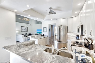 Welcome to effortless living in Palm Colony at Pelican Landing on The Colony Golf and Country Club in Florida - for sale on GolfHomes.com, golf home, golf lot