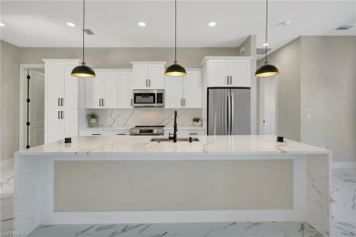 Your Dream Home Is Ready! Welcome to luxury coastal living in on Rotonda Golf and Country Club The Palms Course in Florida - for sale on GolfHomes.com, golf home, golf lot