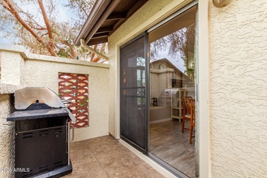 Beautifully updated 2-bedroom, 2-bath condo in the highly on Country Meadows Golf Club in Arizona - for sale on GolfHomes.com, golf home, golf lot