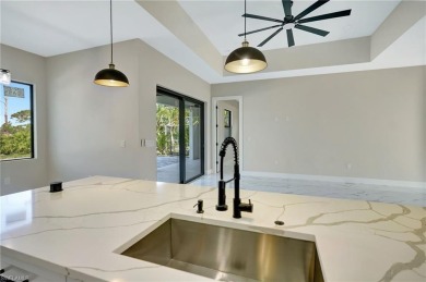 Your Dream Home Is Ready! Welcome to luxury coastal living in on Rotonda Golf and Country Club The Palms Course in Florida - for sale on GolfHomes.com, golf home, golf lot