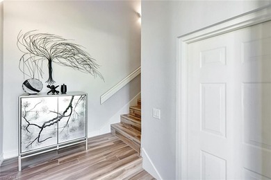 Welcome to effortless living in Palm Colony at Pelican Landing on The Colony Golf and Country Club in Florida - for sale on GolfHomes.com, golf home, golf lot