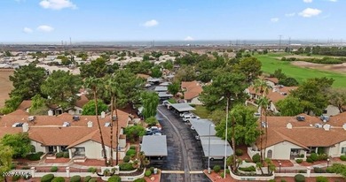 Beautifully updated 2-bedroom, 2-bath condo in the highly on Country Meadows Golf Club in Arizona - for sale on GolfHomes.com, golf home, golf lot