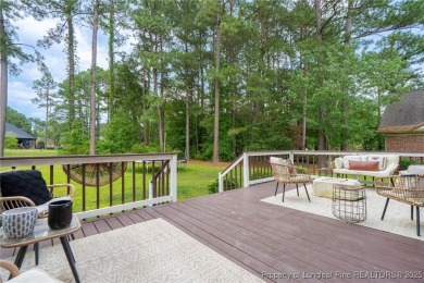 Welcome to your dream home on the scenic Kings Grant Golf Course on Kings Grant Golf and Country Club in North Carolina - for sale on GolfHomes.com, golf home, golf lot