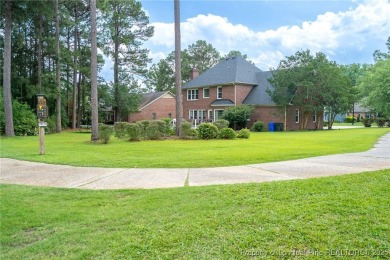 Welcome to your dream home on the scenic Kings Grant Golf Course on Kings Grant Golf and Country Club in North Carolina - for sale on GolfHomes.com, golf home, golf lot