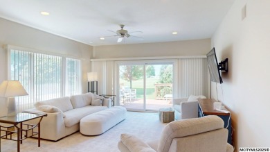 Wake up to stunning views of the Legacy Golf Course in this on Mason City Country Club in Iowa - for sale on GolfHomes.com, golf home, golf lot