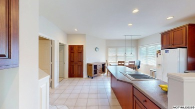 Wake up to stunning views of the Legacy Golf Course in this on Mason City Country Club in Iowa - for sale on GolfHomes.com, golf home, golf lot