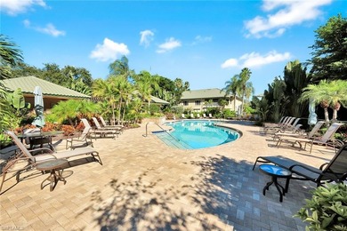 Welcome to effortless living in Palm Colony at Pelican Landing on The Colony Golf and Country Club in Florida - for sale on GolfHomes.com, golf home, golf lot