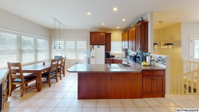 Wake up to stunning views of the Legacy Golf Course in this on Mason City Country Club in Iowa - for sale on GolfHomes.com, golf home, golf lot