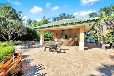 Welcome to effortless living in Palm Colony at Pelican Landing on The Colony Golf and Country Club in Florida - for sale on GolfHomes.com, golf home, golf lot