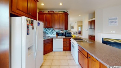 Wake up to stunning views of the Legacy Golf Course in this on Mason City Country Club in Iowa - for sale on GolfHomes.com, golf home, golf lot