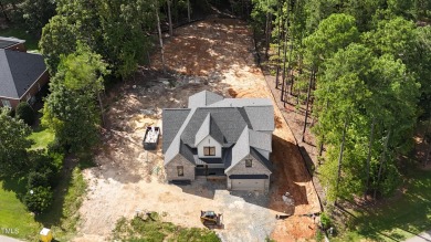 Welcome to Whitecroft Manor, a stunning custom home built by on Eagle Ridge Golf Course in North Carolina - for sale on GolfHomes.com, golf home, golf lot