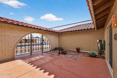 On THE LAKES WEST GOLF COURSE! Enter thru iron gates to front on Sun City Lakes West and East in Arizona - for sale on GolfHomes.com, golf home, golf lot