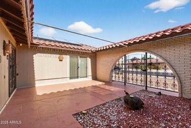 On THE LAKES WEST GOLF COURSE! Enter thru iron gates to front on Sun City Lakes West and East in Arizona - for sale on GolfHomes.com, golf home, golf lot