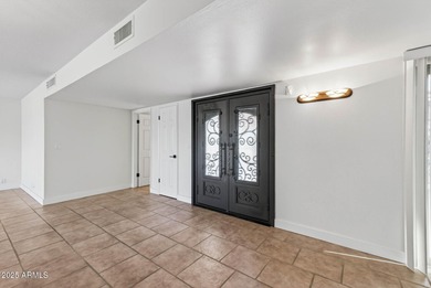 On THE LAKES WEST GOLF COURSE! Enter thru iron gates to front on Sun City Lakes West and East in Arizona - for sale on GolfHomes.com, golf home, golf lot