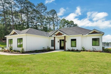 STUNNING MODERN LAKEFRONT HOME ON LAKE SINCLAIR! This sleek and on Milledgeville Country Club in Georgia - for sale on GolfHomes.com, golf home, golf lot