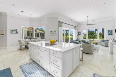 Elegantly designed 2 story home overlooking lake & fairways is on Sailfish Point Golf Club, Inc. in Florida - for sale on GolfHomes.com, golf home, golf lot