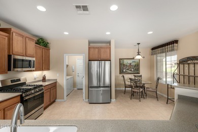 EXPLORE RESORT LIVING IN ARIZONA!! Classy Newport model, fully on Poston Butte Golf Club in Arizona - for sale on GolfHomes.com, golf home, golf lot